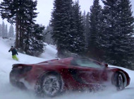 snowboarder-races-mclaren
